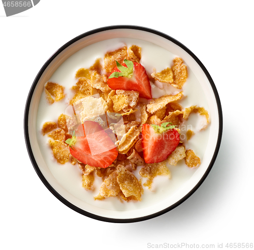 Image of sweet cornflakes with milk and strawberries