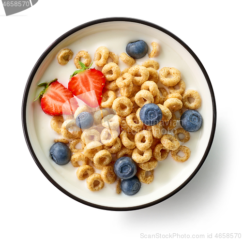 Image of breakfast rings with milk and berries