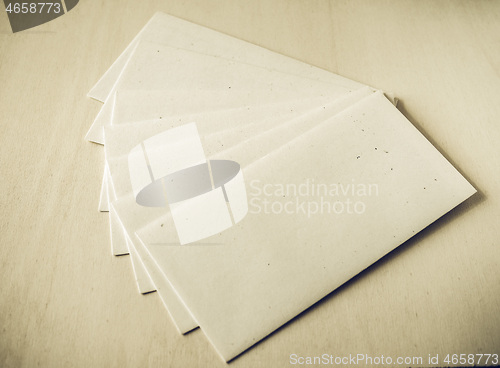 Image of Vintage looking Letter envelope on wood table