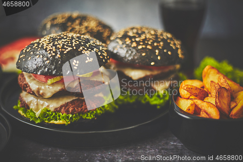 Image of Double beef burger with vegetables and cheese