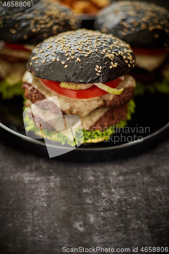 Image of Double beef burger with vegetables and cheese