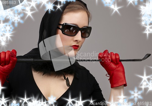 Image of lady in red gloves with crop