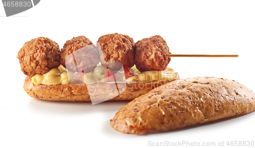 Image of toasted bread with meat balls