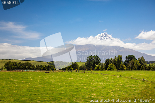 Image of volcano Taranaki covered in clouds, New Zealand 