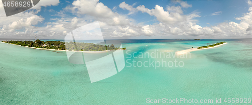 Image of Picture perfect beach and turquoise lagoon on small tropical island on Maldives