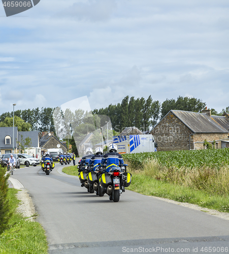 Image of Row of French Policemen on Bikes - Tour de France 2016