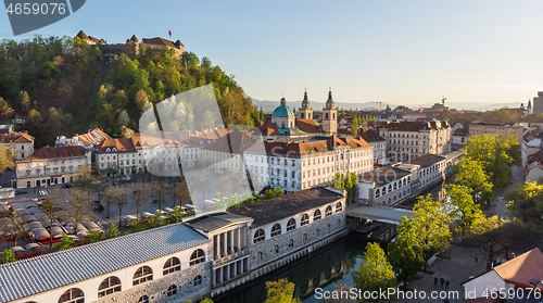 Image of Aerial drone panoramic view of Ljubljana medieval city center, capital of Slovenia in warm afternoon sun. Empty streets during corona virus pandemic social distancing measures