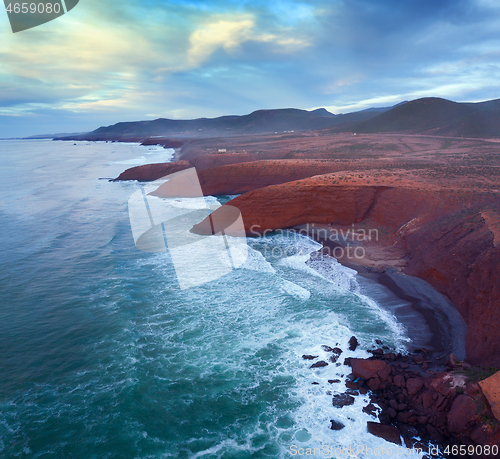 Image of Legzira beach with arched rocks