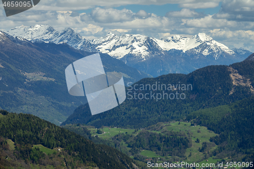 Image of Snow mountains and village in Switzerland