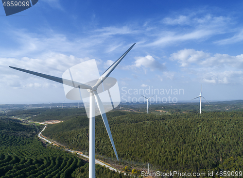 Image of Windmills or wind turbine on wind farm