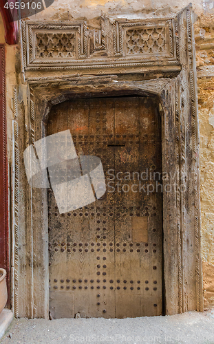 Image of Old wooden door in medina of Fes