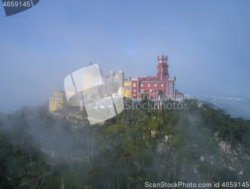 Image of Pena Palace in fog and clouds in Sintra