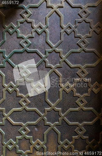 Image of maroccan ornate metal door pattern