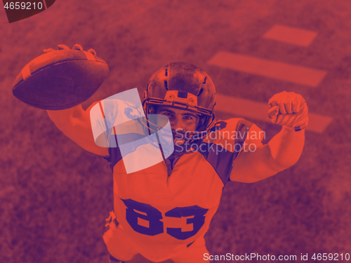 Image of american football player celebrating touchdown