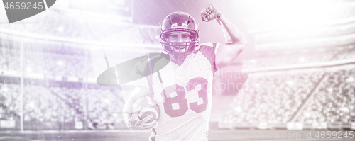 Image of american football player celebrating touchdown