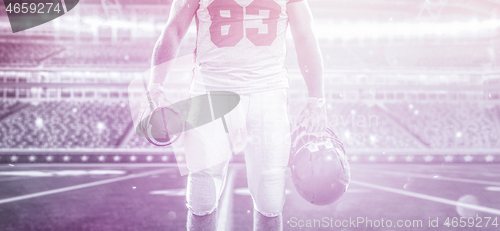 Image of closeup American Football Player isolated on big modern stadium