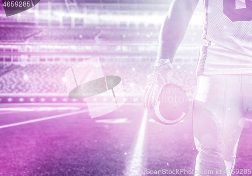 Image of closeup American Football Player isolated on big modern stadium