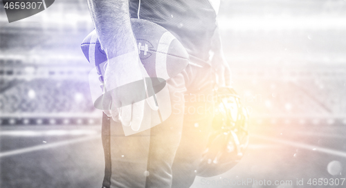 Image of closeup American Football Player isolated on big modern stadium