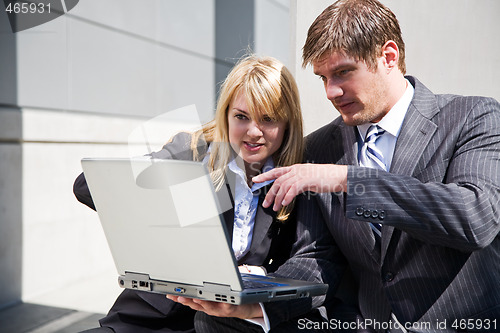 Image of Working caucasian business people