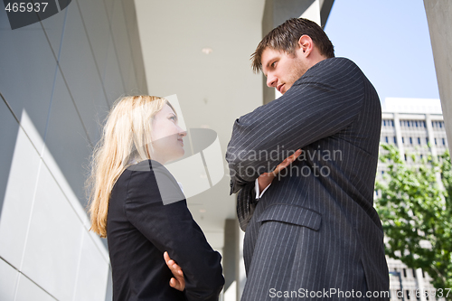 Image of Two angry caucasian business people