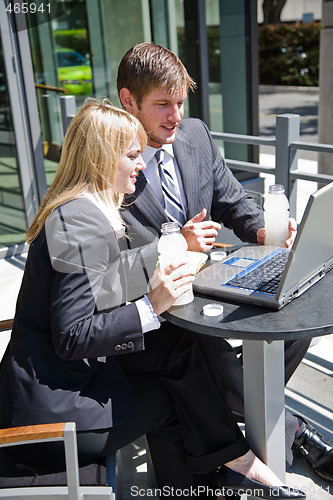 Image of Caucasian business people having discussion