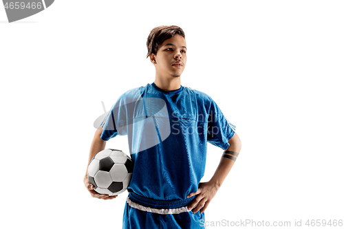 Image of Young fit boy with soccer ball standing isolated on white