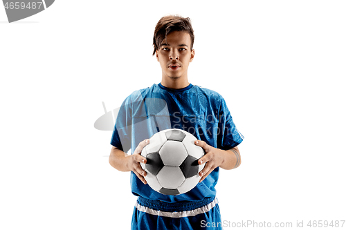 Image of Young fit boy with soccer ball standing isolated on white