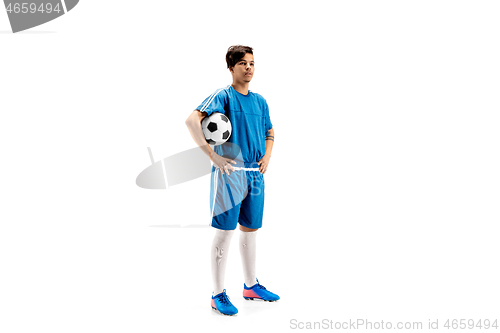 Image of Young fit boy with soccer ball standing isolated on white