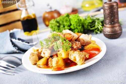 Image of fried meat with vegetbales