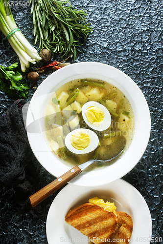 Image of soup with vegetables and egg