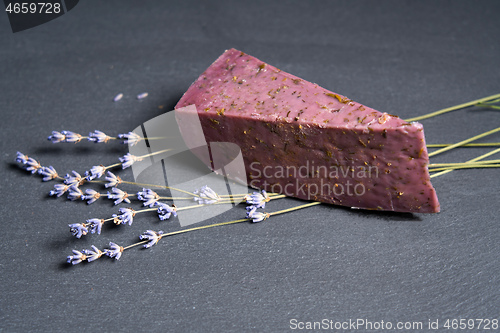 Image of Lavender cheese with bunch of fresh lavender flowers