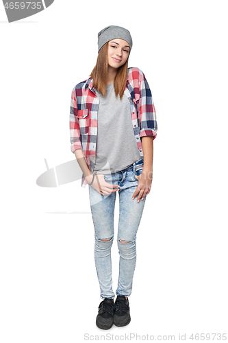 Image of Smiling casual teen girl in full length