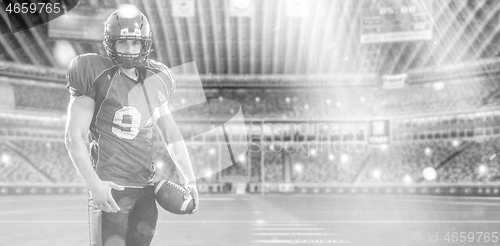 Image of American Football Player isolated on big modern stadium field