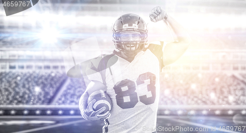 Image of american football player celebrating touchdown