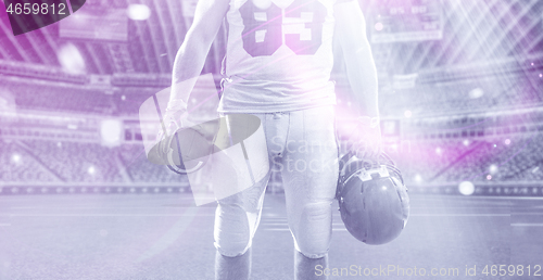 Image of closeup American Football Player isolated on big modern stadium