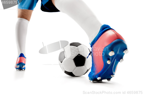 Image of legs of soccer player close-up isolated on white