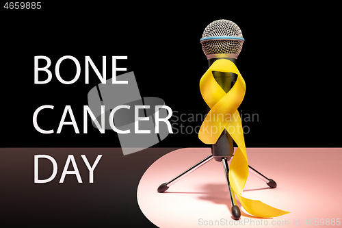 Image of Yellow ribbon symbolic color for Sarcoma Bone cancer awareness and suicide prevention