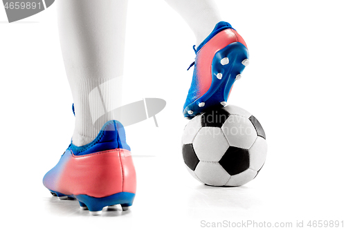 Image of legs of soccer player close-up isolated on white