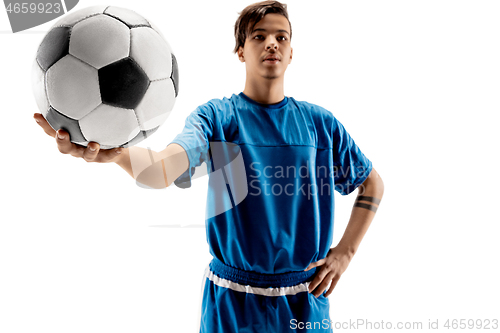 Image of Young fit boy with soccer ball standing isolated on white