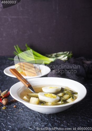 Image of soup with vegetables and egg