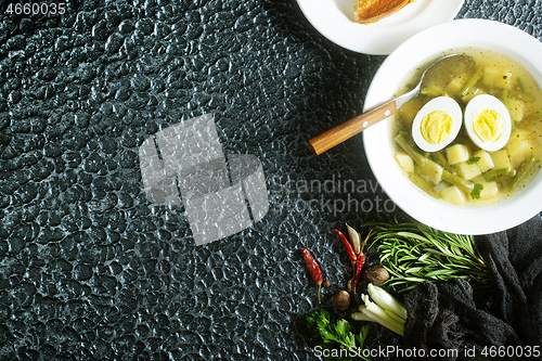 Image of soup with vegetables and egg