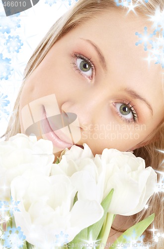 Image of happy girl with white tulips