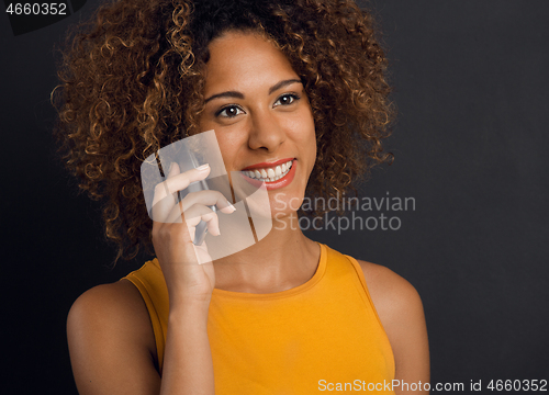 Image of On the phone with her Best Friend