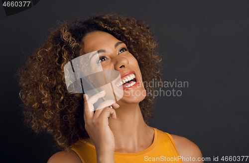 Image of On the phone with her Best Friend