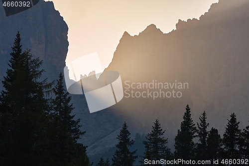 Image of Sunrise between mountain cliffs