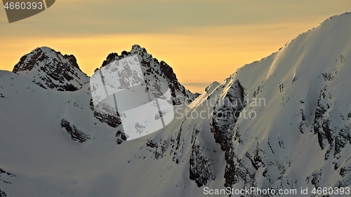 Image of Mountains with snow in dusk
