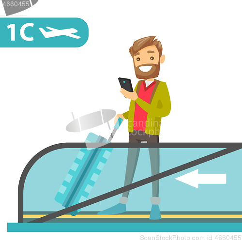 Image of A traveller in an airport with a smartphone and a suitcase.
