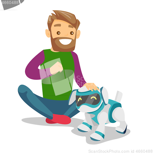 Image of White man playing with dog robot