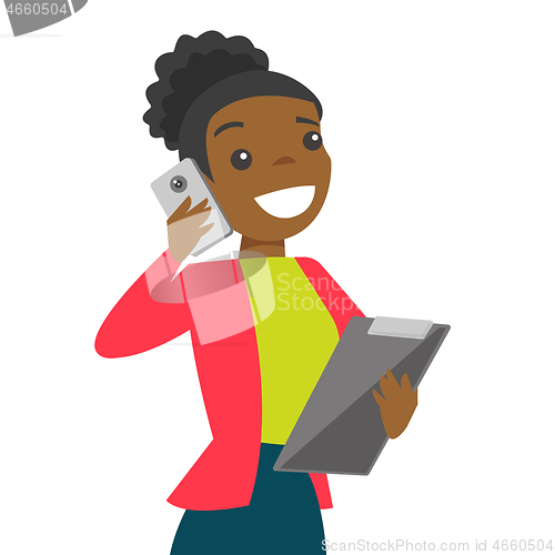 Image of Black businesswoman negotiating on smartphone
