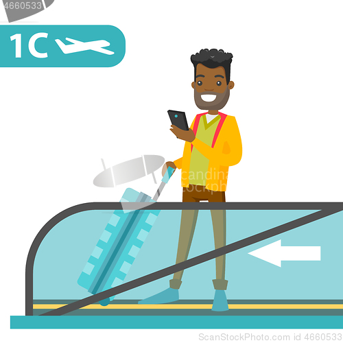 Image of A traveller in an airport with a smartphone and a suitcase.